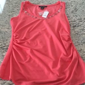 White House Black Market sleeveless shirt.